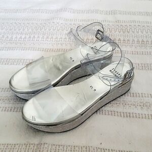 Stuart Weitzman silver glitter platform clear ankle strap occasion shoes, 6.5